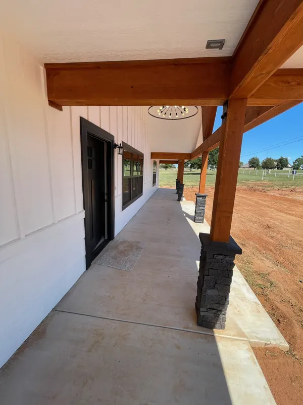Porch timber beams and stone column