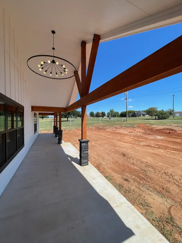 Porch chandelier and timber beams