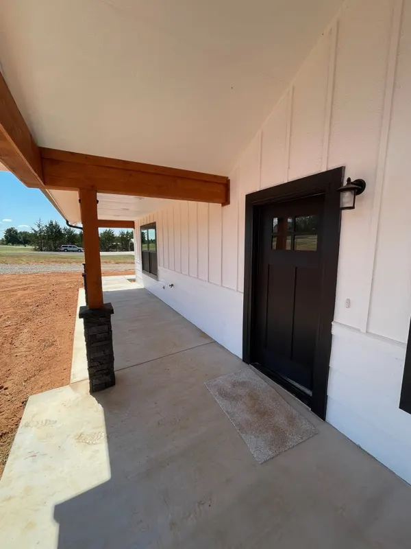 Front door on a covered porch