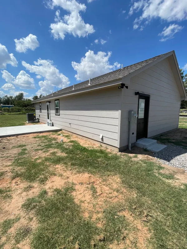 Side view of a gray-sided home