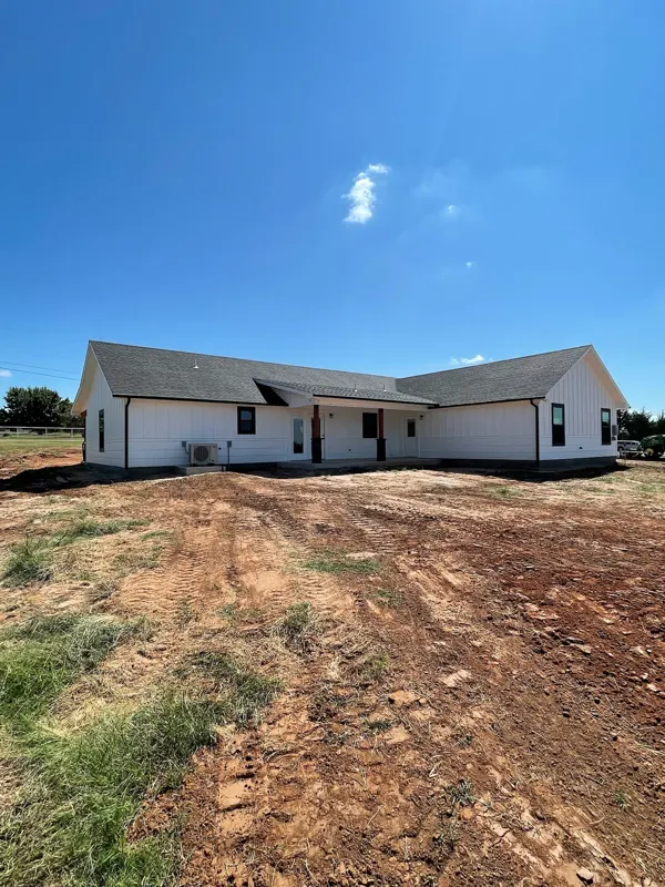 Back of a white farmhouse