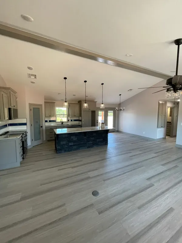 Open kitchen and living room with stone island