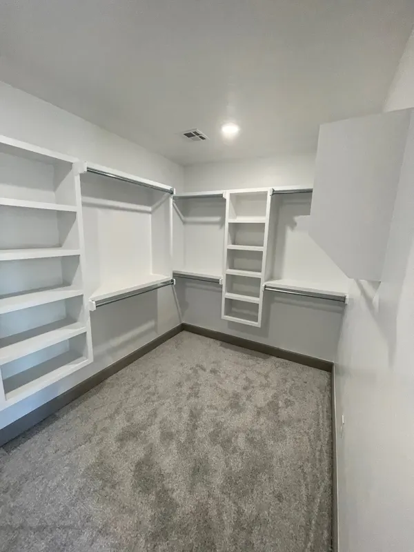 Walk-in closet with built-in shelves