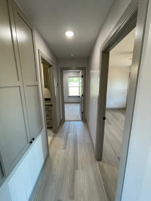 Hallway with doors on both sides