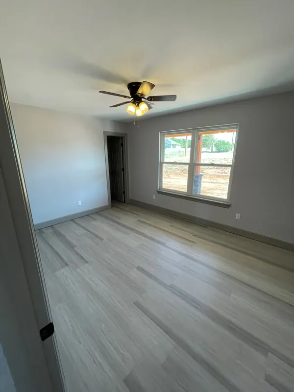 Bedroom with wood-look floors