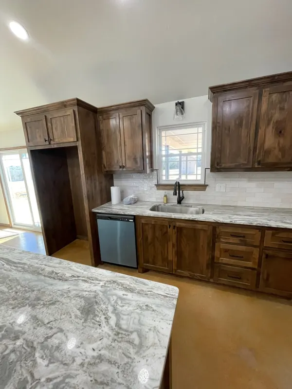Kitchen island and sink wall