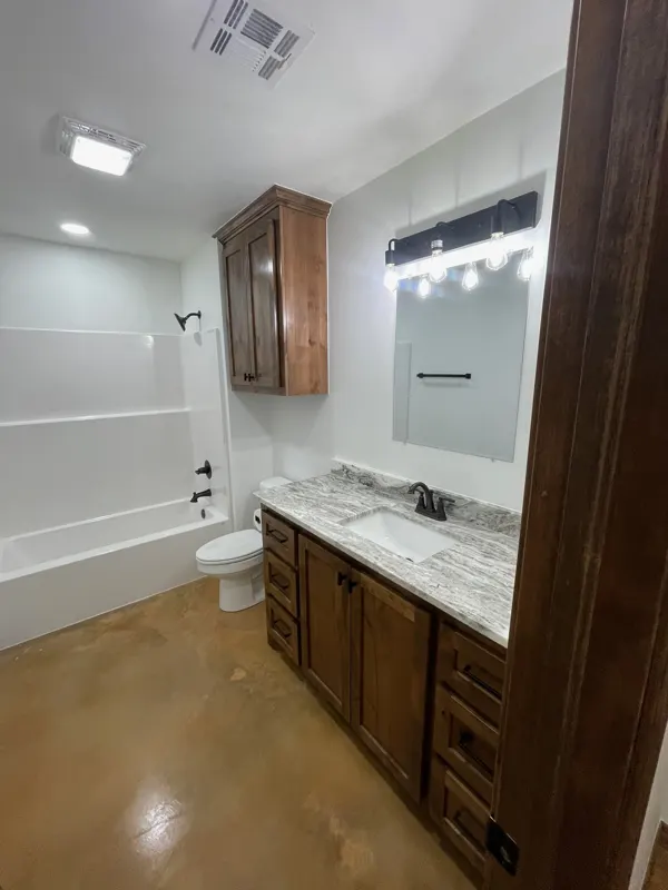 Bathroom with wood vanity